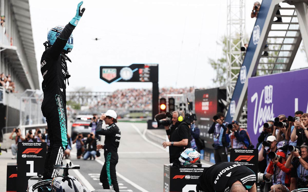 2026年F1加拿大大奖赛排位赛，夺得杆位的拉塞尔在检录区举手庆祝