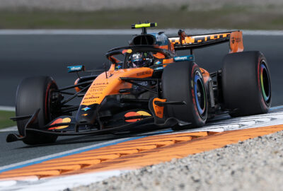 2026年F1荷兰大奖赛排位赛，诺里斯驾驶迈凯伦利用路肩攻向赞德沃特赛道弯角