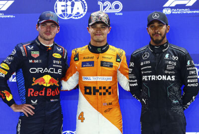 2024年F1新加坡大奖赛排位赛，杆位得主诺里斯、第二名维斯塔潘与第三名汉密尔顿合影