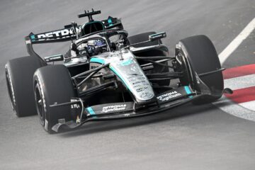 2026年10月9日F1新加坡大奖赛一练，乔治·拉塞尔驾驶63号梅赛德斯赛车通过弯道。