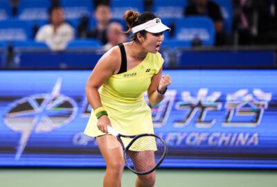 2026年10月12日武汉网球公开赛，施晗在女单首轮比赛中庆祝得分。