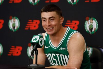Archive photo of Pritchard being interviewed, used in Boston's official extension announcement