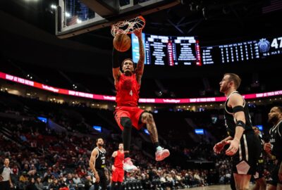 Archive photo of Jeremy Sochan dunking in a No. 4 jersey, used in Portland's release announcement