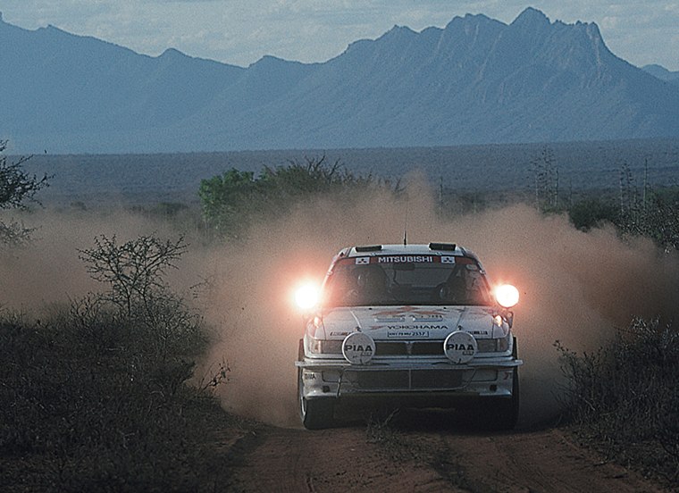 A Mitsubishi Galant VR-4 competing on African gravel roads, from the official 1988–1992 archive; the specific crew and round are unconfirmed
