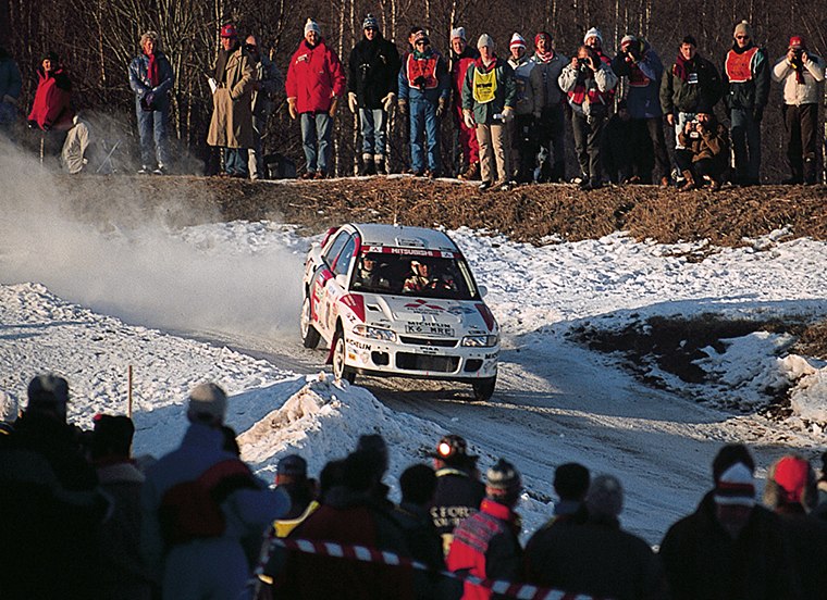 A Mitsubishi Lancer Evolution II competing on snow, from Mitsubishi's official 1995 Swedish Rally archive