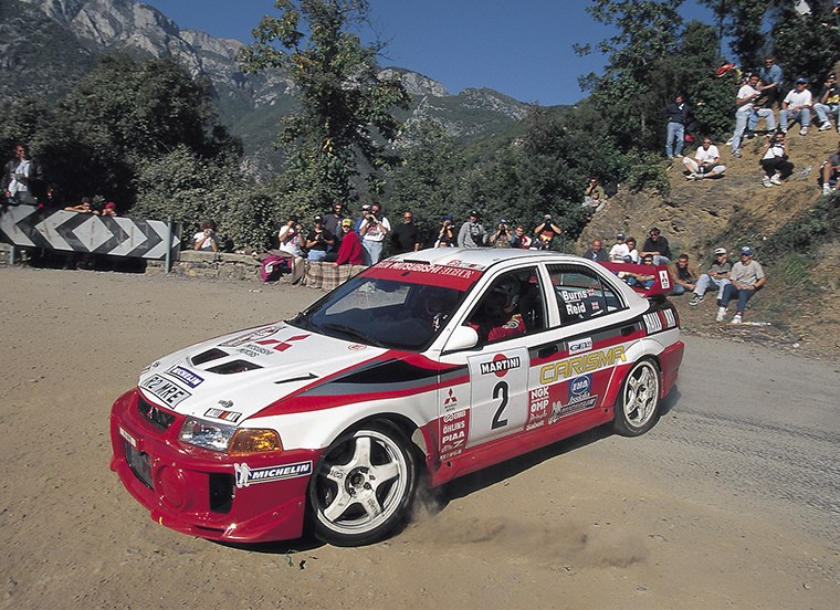 Richard Burns driving the No. 2 Mitsubishi Lancer Evolution V in an archive photograph from around 1998; the specific round is unknown