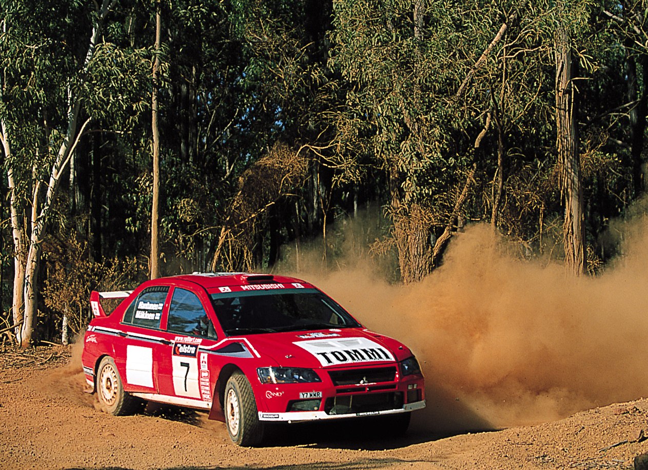 Tommi Mäkinen driving a No. 7 Mitsubishi Evo competition car in an early-2001 archive photograph