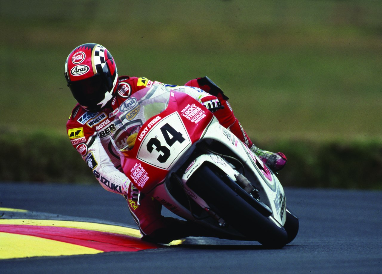 Kevin Schwantz riding the No. 34 Suzuki RGV500 during his Grand Prix career; the exact year and round are not identified
