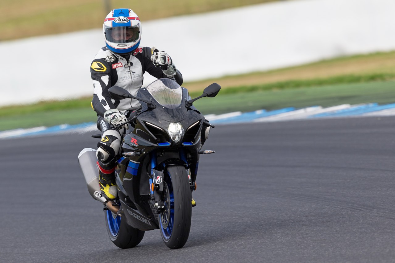Kevin Schwantz riding a GSX-R at an event after retirement; an archive image from Suzuki Press news in 2017
