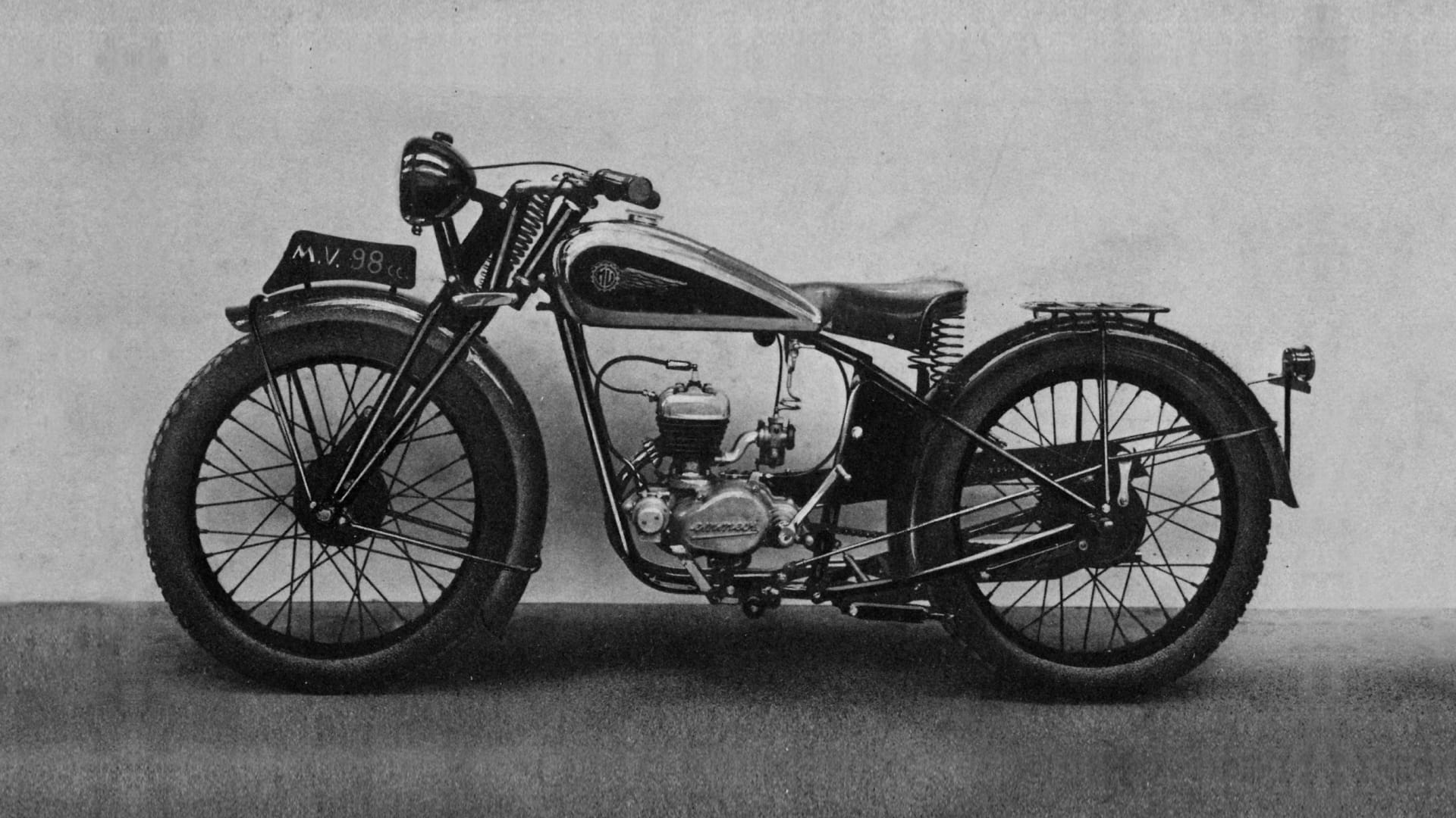 Black-and-white side view of an early MV 98 road motorcycle